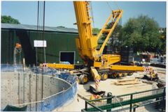 800 ton crane lowering 7M cutting head into the tunnel.